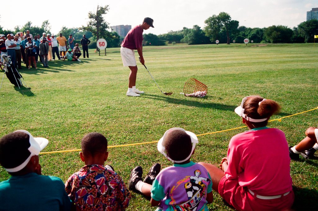Tiger Woods hitting golf balls - Chicago Sun-Times