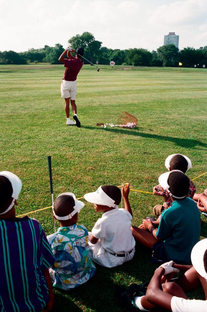 Tiger Woods hitting golf balls - Chicago Sun-Times