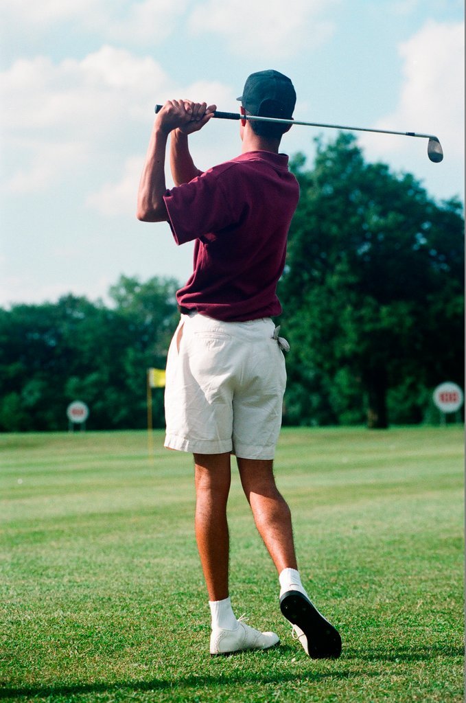 Tiger Woods hitting golf balls - Chicago Sun-Times