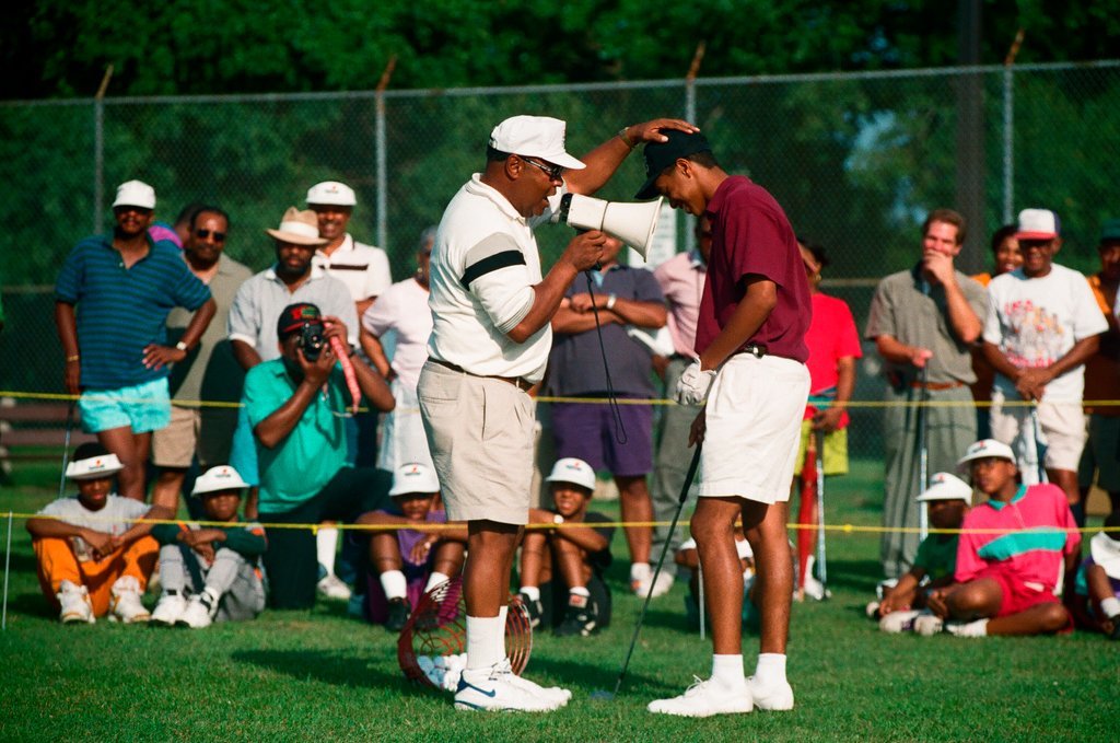 Tiger Woods hitting golf balls - Chicago Sun-Times