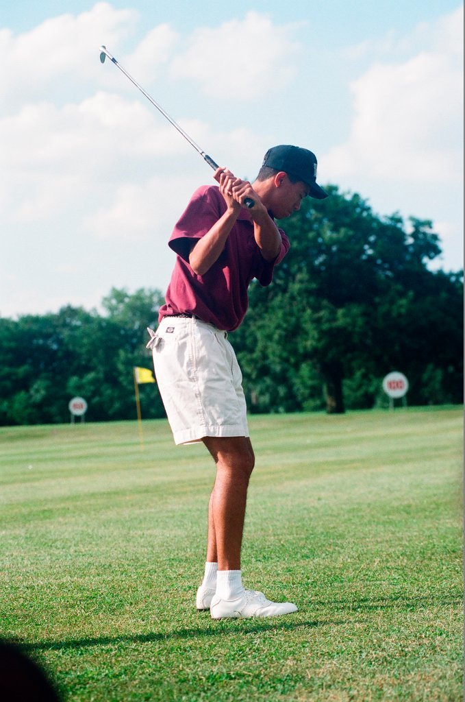 Tiger Woods hitting golf balls - Chicago Sun-Times