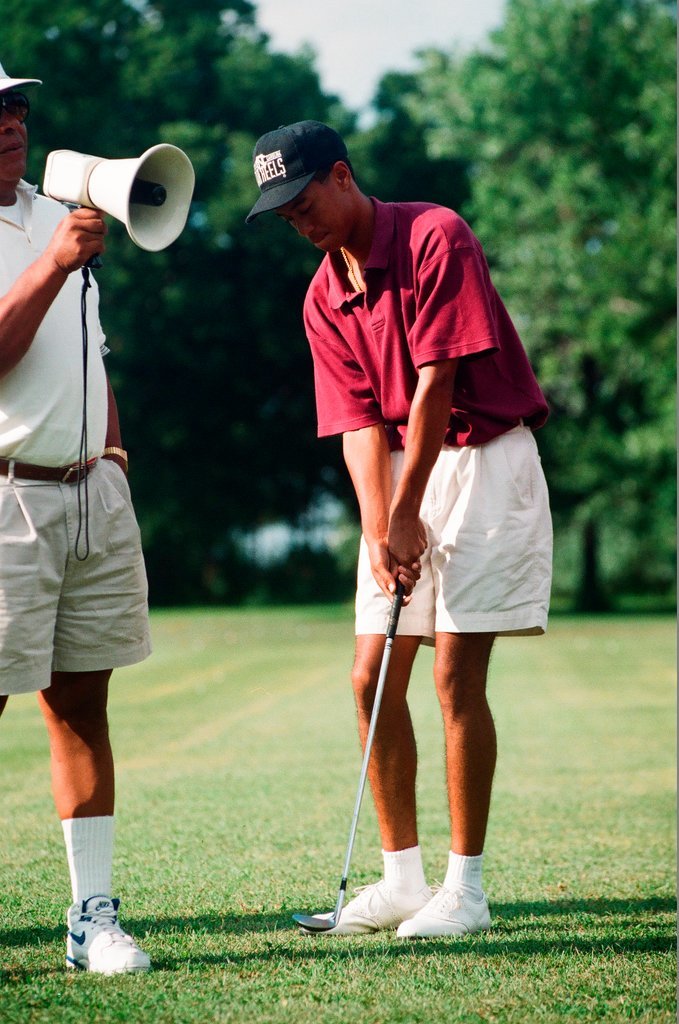 Tiger Woods hitting golf balls - Chicago Sun-Times