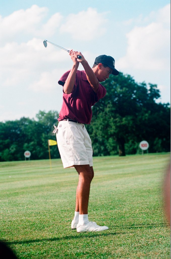 Tiger Woods hitting golf balls - Chicago Sun-Times