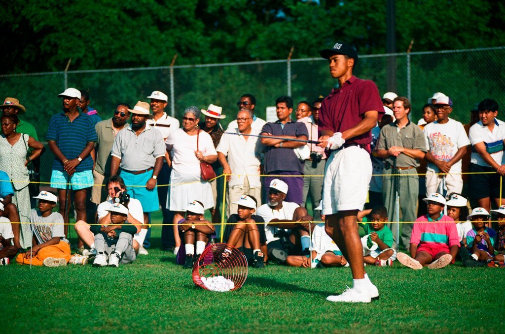 Tiger Woods hitting golf balls - Chicago Sun-Times