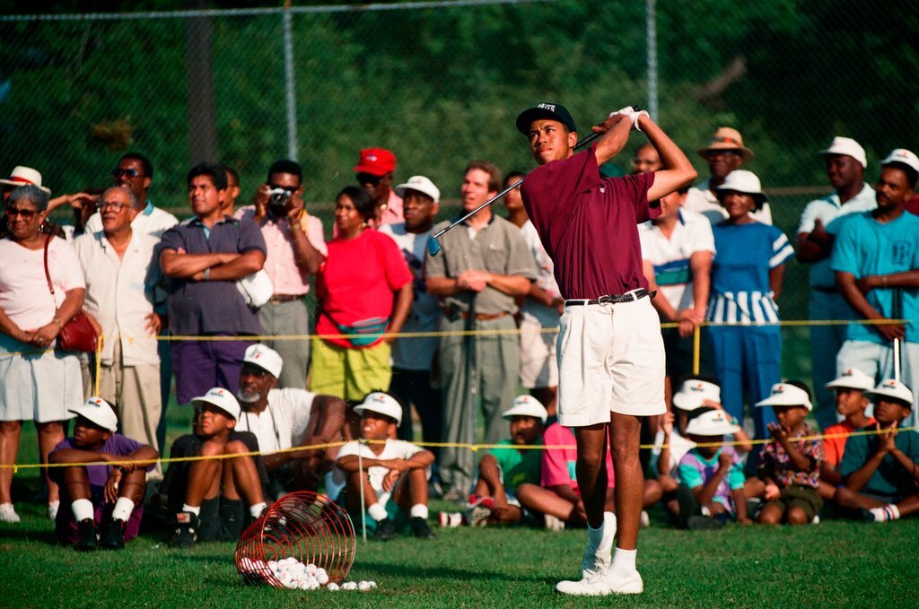 Tiger Woods hitting golf balls - Chicago Sun-Times