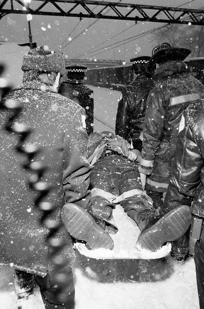 Injured people at the site of a commuter train accident - Chicago Sun-Times