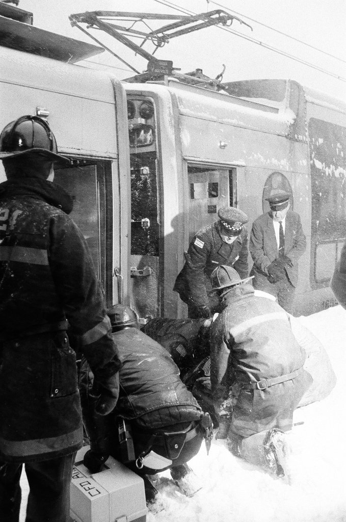 Injured people at the site of a commuter train accident - Chicago Sun-Times