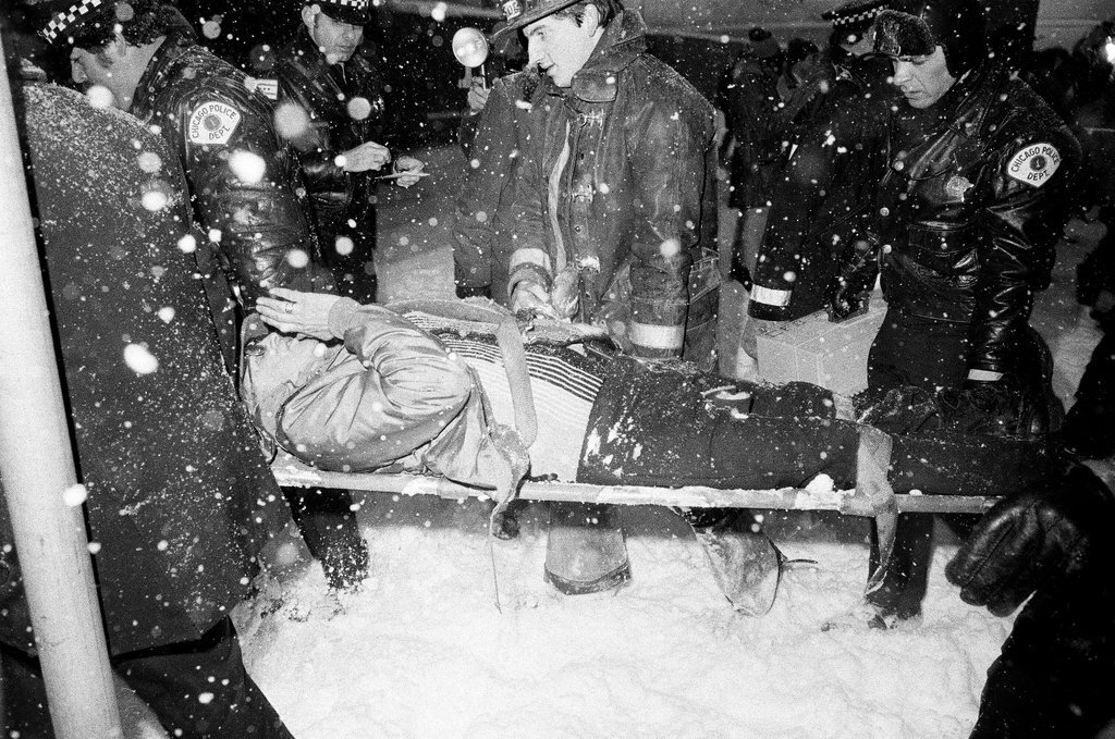 Injured people at the site of a commuter train accident - Chicago Sun-Times
