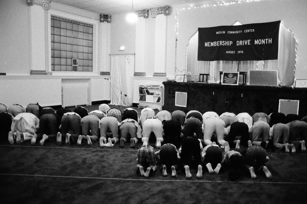 Muslim men praying at community center - Chicago Sun-Times