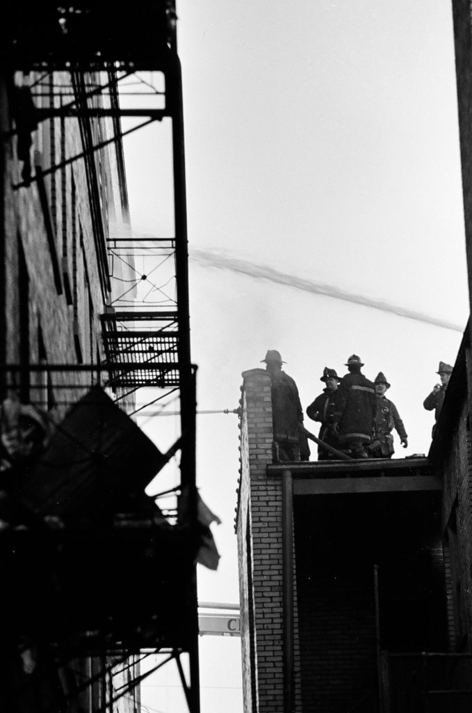 Firefighters at building on South Ellis - Chicago Sun-Times