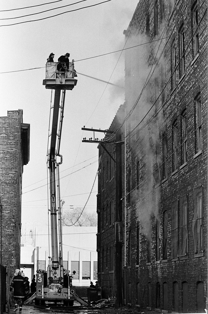 Firefighters at building on South Ellis - Chicago Sun-Times