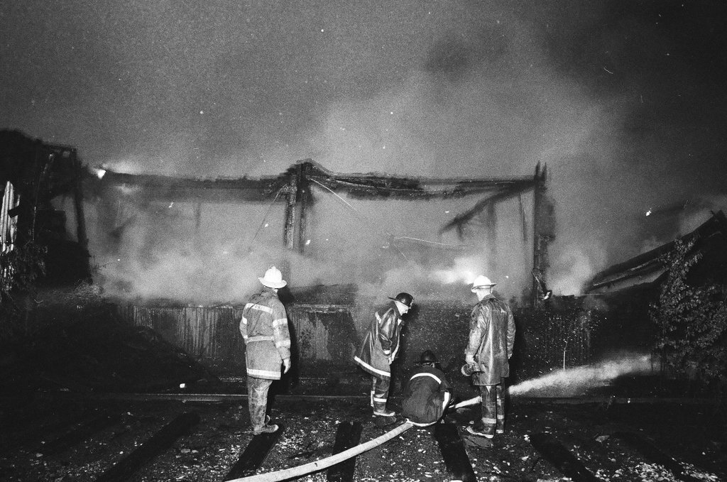 Firefighters wield hoses at the scene of a fire - Chicago Sun-Times