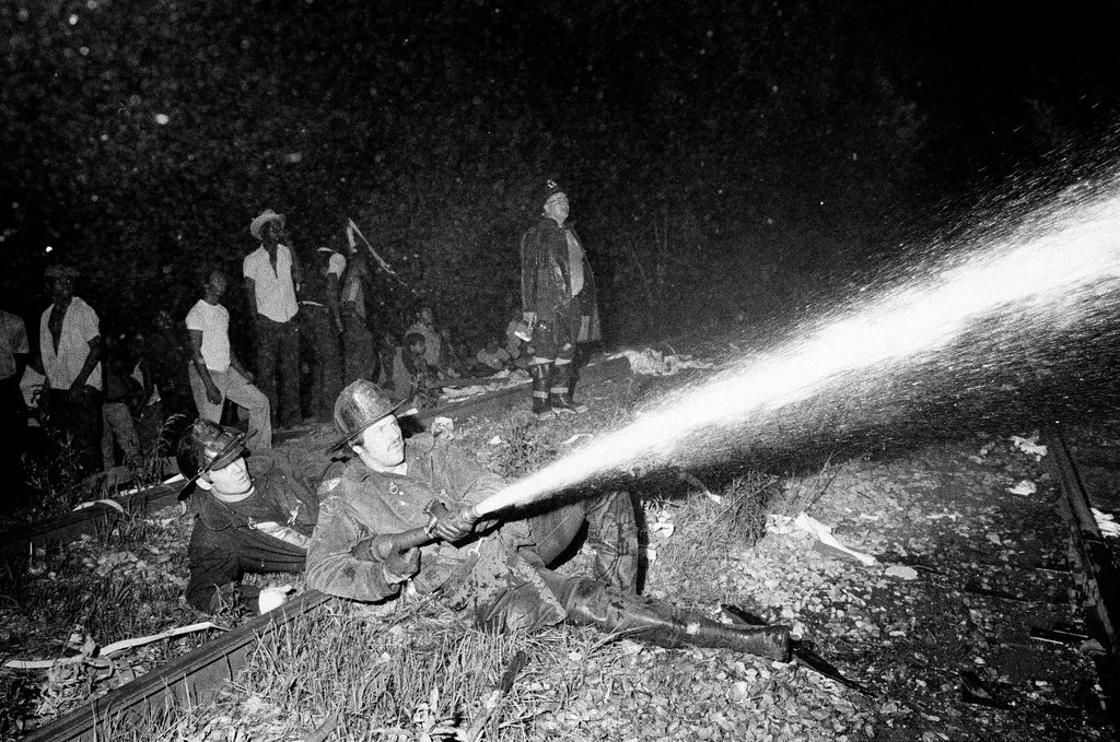 Firefighters wield hoses at the scene of a fire - Chicago Sun-Times