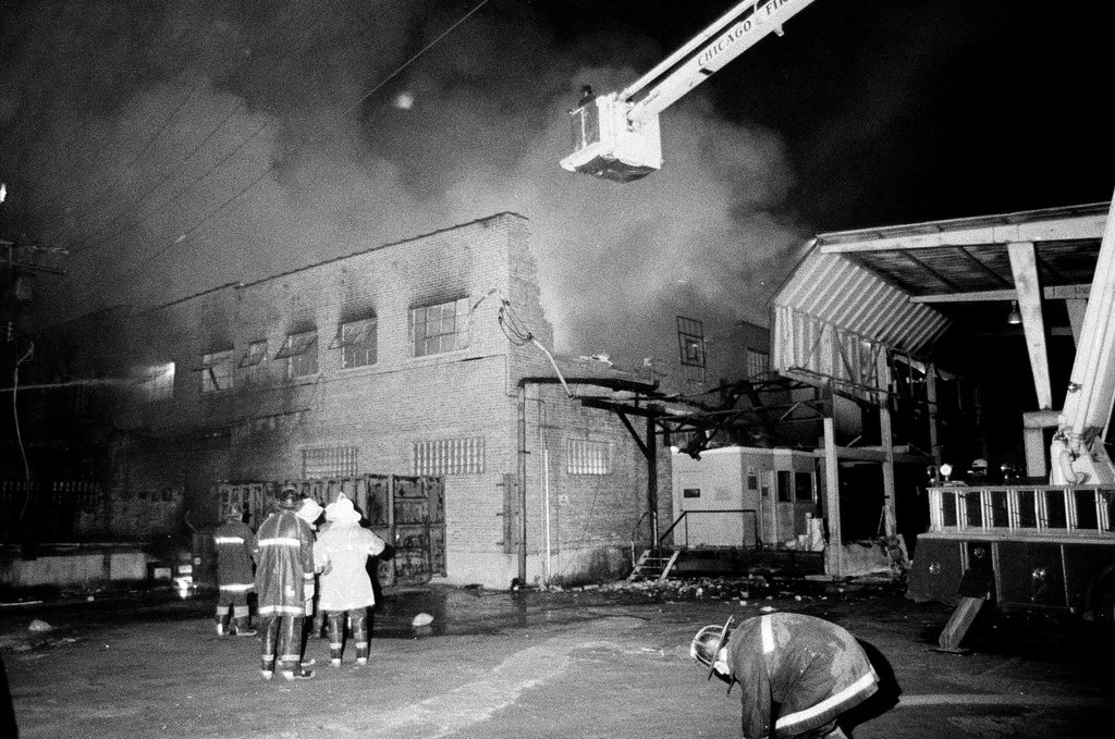 Firefighters wield hoses at the scene of a fire - Chicago Sun-Times