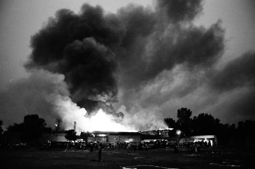 Firefighters wield hoses at the scene of a fire - Chicago Sun-Times