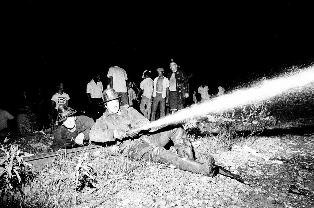 Firefighters wield hoses at the scene of a fire - Chicago Sun-Times