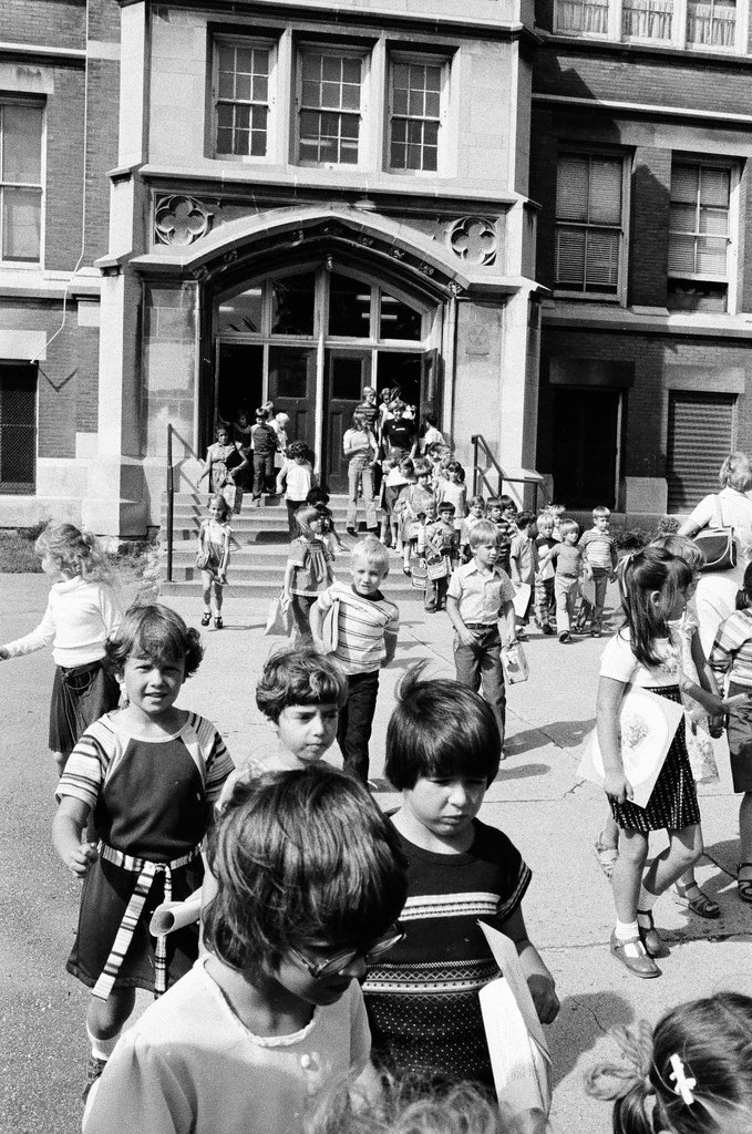 Children exiting John F. Eberhart school - Carmen Reporto for Chicago Sun-Times