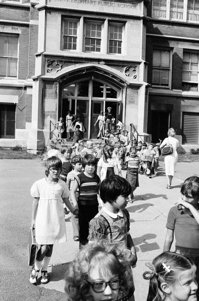Children exiting John F. Eberhart school - Carmen Reporto for Chicago Sun-Times