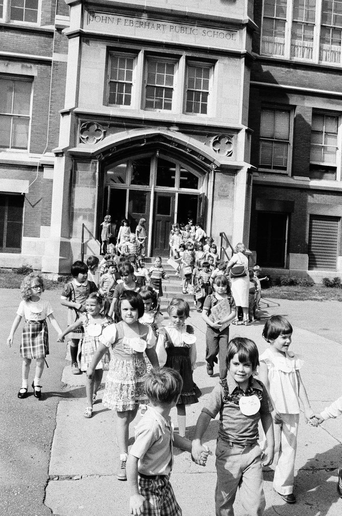Children exiting John F. Eberhart school - Carmen Reporto for Chicago Sun-Times