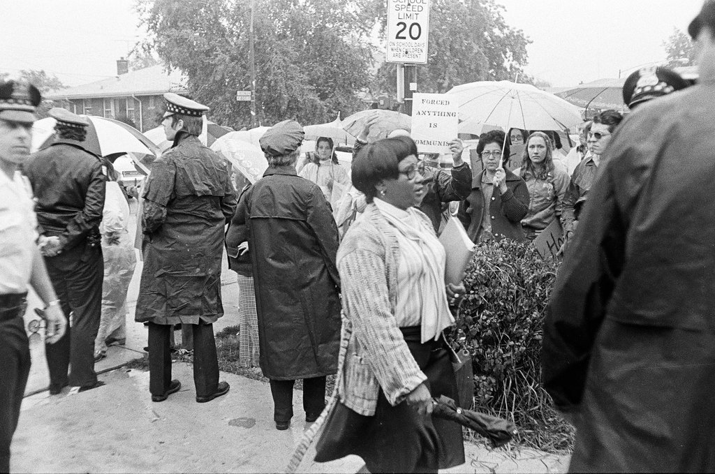 People protest busing in the rain at Stevenson Elementary - Edmund Jarecki for Chicago Sun-Times