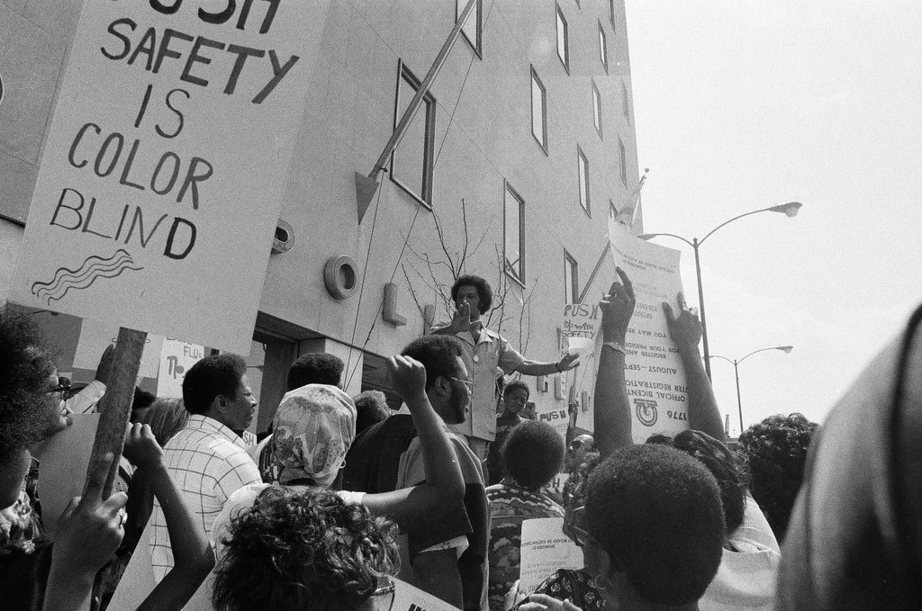 People protest racist behavior outside police headquarters - Jim Frost for Chicago Sun-Times