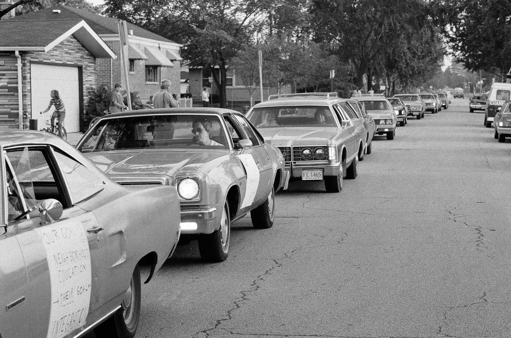 Cars leave Bogan High School boycotting class - Jack Lenahan for Chicago Sun-Times
