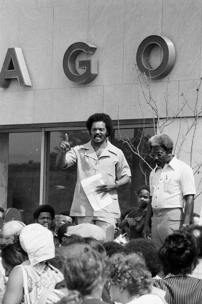 People protest racist behavior outside police headquarters - Jim Frost for Chicago Sun-Times