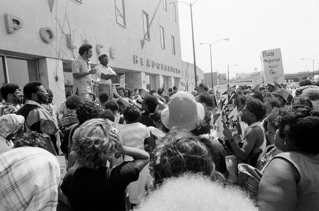 People protest racist behavior outside police headquarters - Jim Frost for Chicago Sun-Times