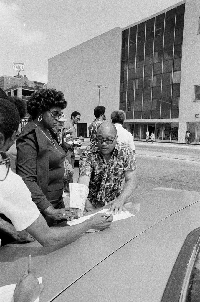 People protest racist behavior outside police headquarters - Jim Frost for Chicago Sun-Times