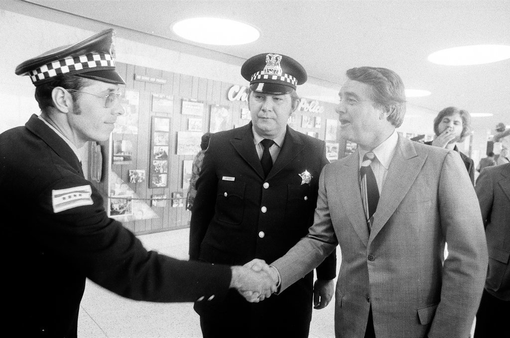 Sargent R. Shriver visits police headquarters - John H. White for Chicago Sun-Times
