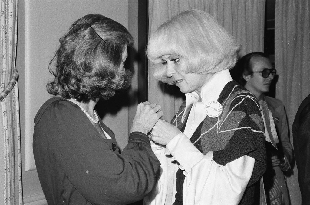 Sargent R. Shriver and his wife at a cocktail party - Henry Herr Gill for Chicago Sun-Times