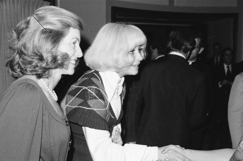 Sargent R. Shriver and his wife at a cocktail party - Henry Herr Gill for Chicago Sun-Times