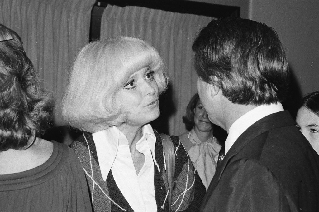 Sargent R. Shriver and his wife at a cocktail party - Henry Herr Gill for Chicago Sun-Times