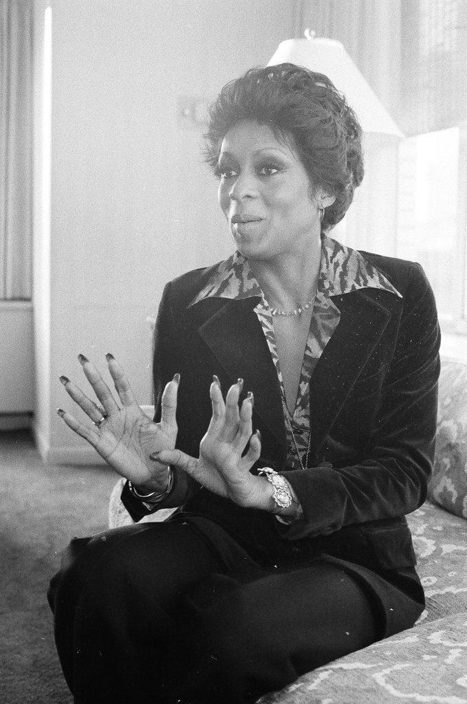 Lola Falana sitting on a couch - Fred Stein for Chicago Daily News