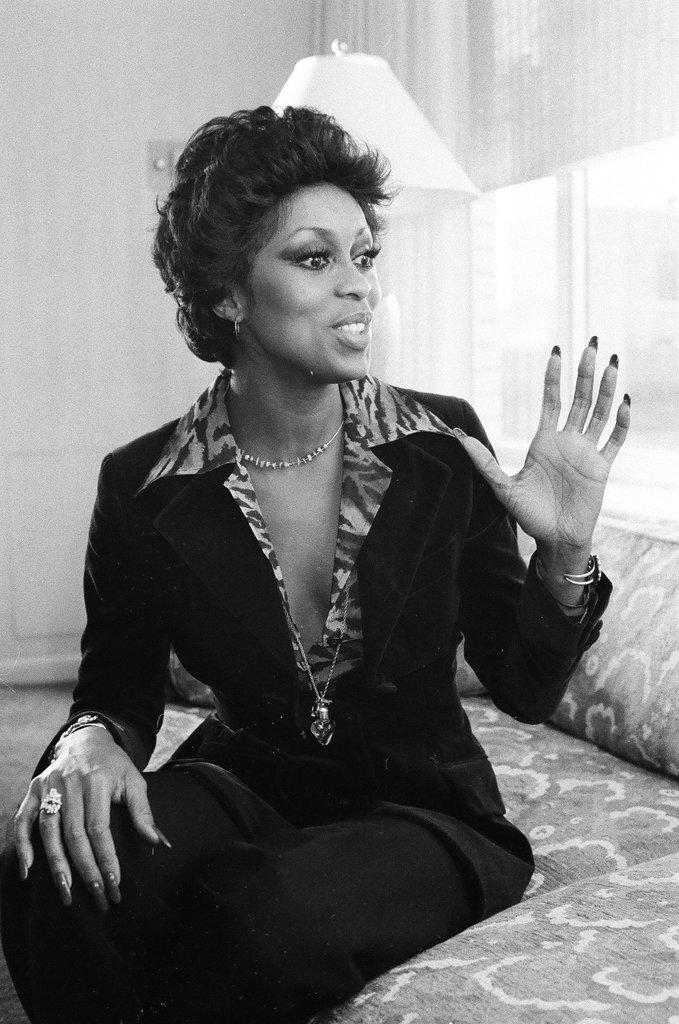 Lola Falana sitting on a couch - Fred Stein for Chicago Daily News