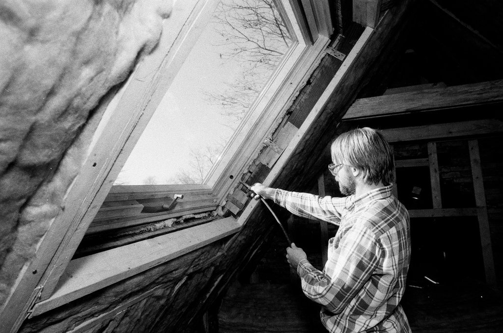 Workers install insulation in a house - Gene Pesek for Chicago Sun-Times