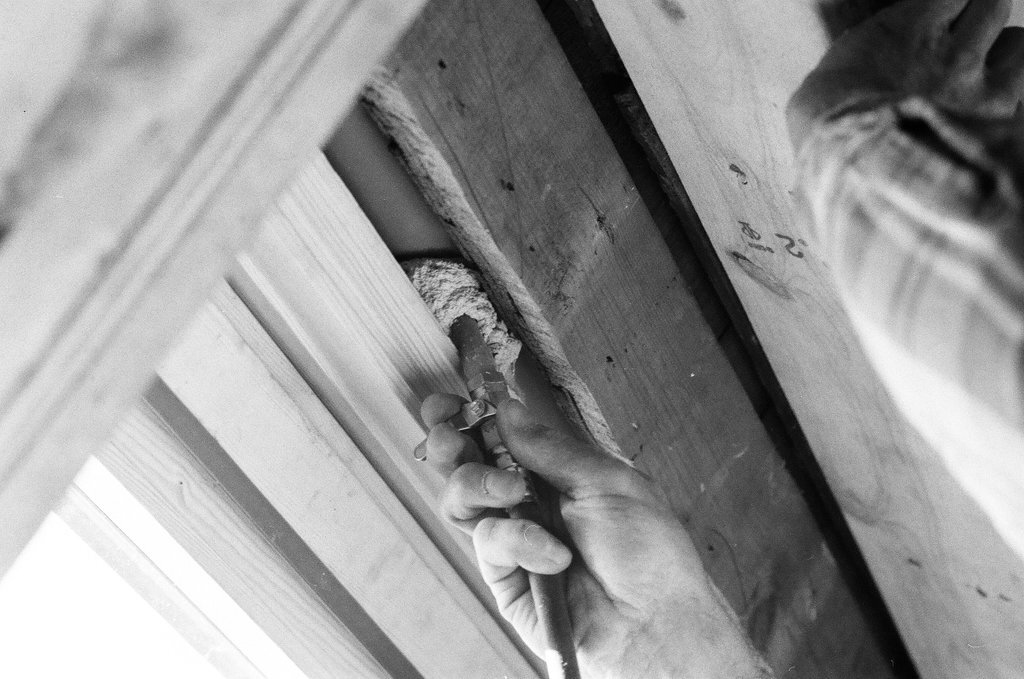Workers install insulation in a house - Gene Pesek for Chicago Sun-Times
