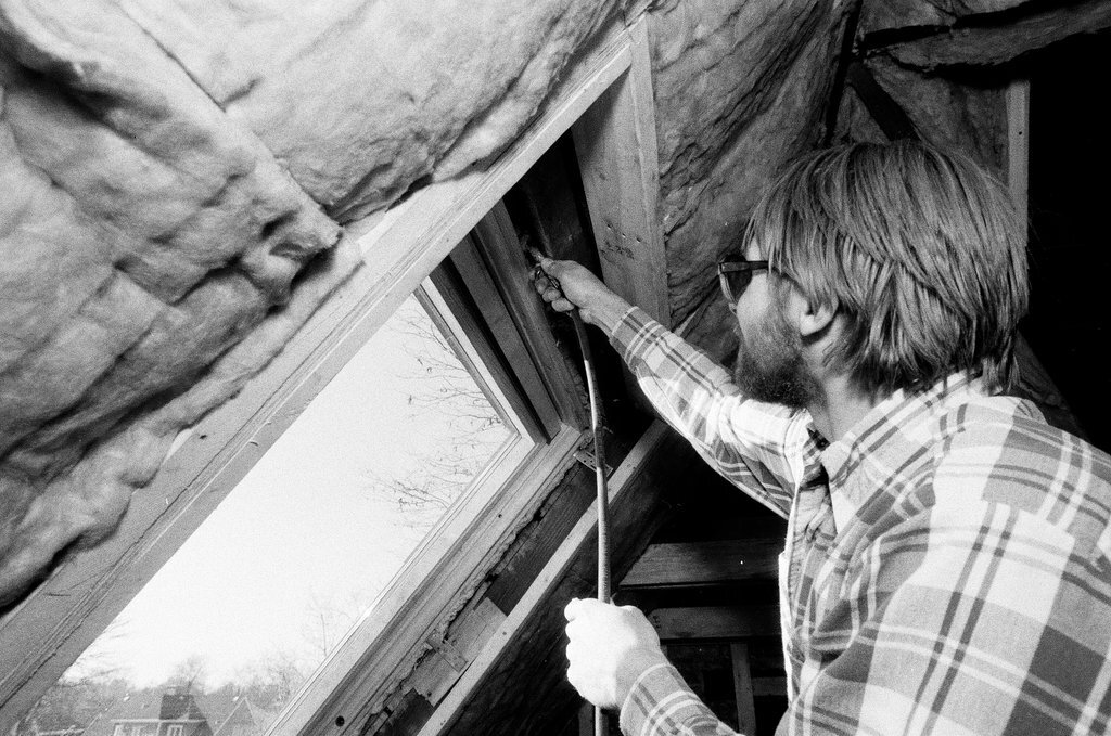 Workers install insulation in a house - Gene Pesek for Chicago Sun-Times