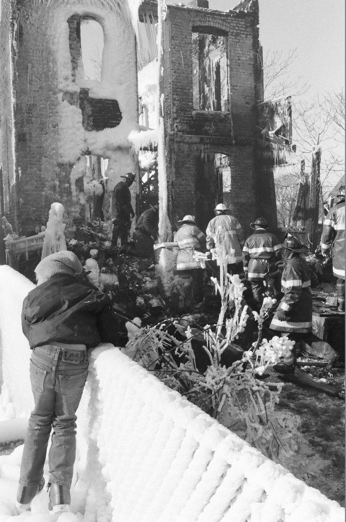 Firemen retrieve bodies from house fire - Al Podgorski for Chicago Sun-Times