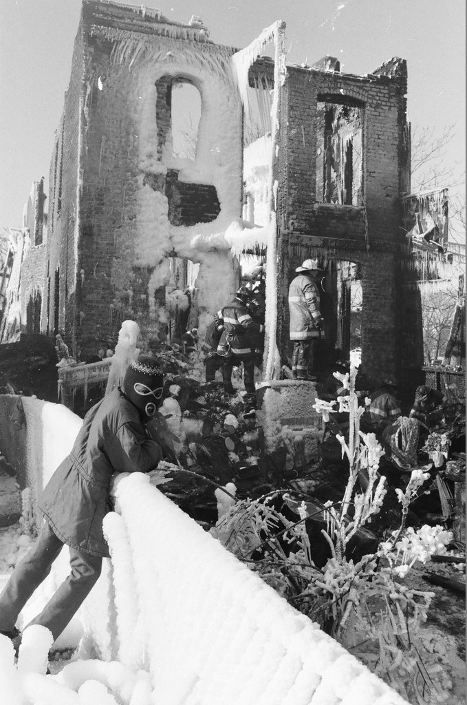Firemen retrieve bodies from house fire - Al Podgorski for Chicago Sun-Times