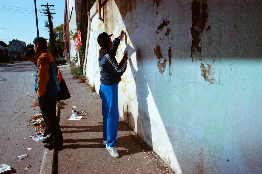 Graffiti artists paint a viaduct - Ellen Domke for Chicago Sun-Times