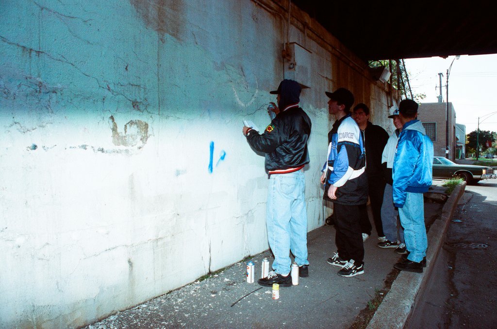 Graffiti artists paint a viaduct - Ellen Domke for Chicago Sun-Times