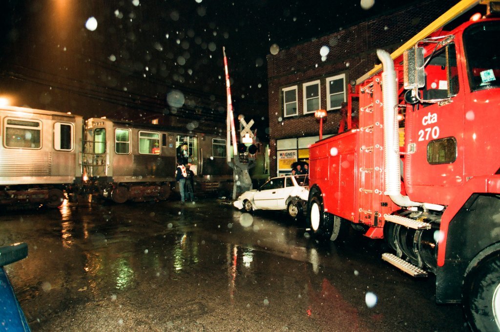 Car and train collide near the Rockwell Station - Jon Sall for Chicago Sun-Times