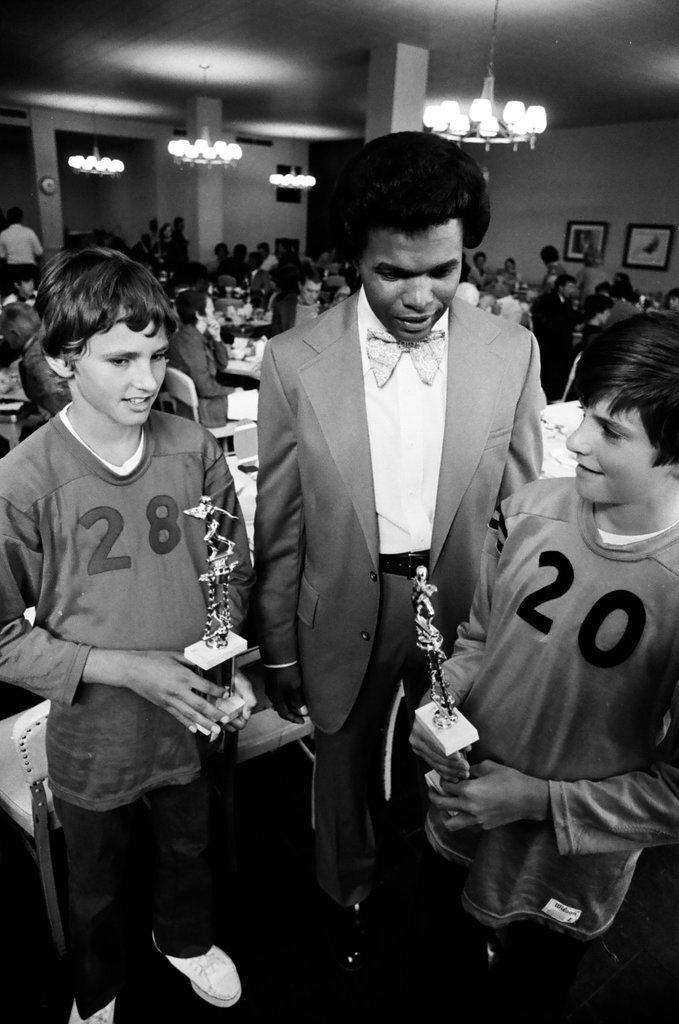 Gale Sayers with Brian Farbisz and Joseph Kuchta, the Junior Football League winners - M. Leon Lopez for Chicago Sun-Times