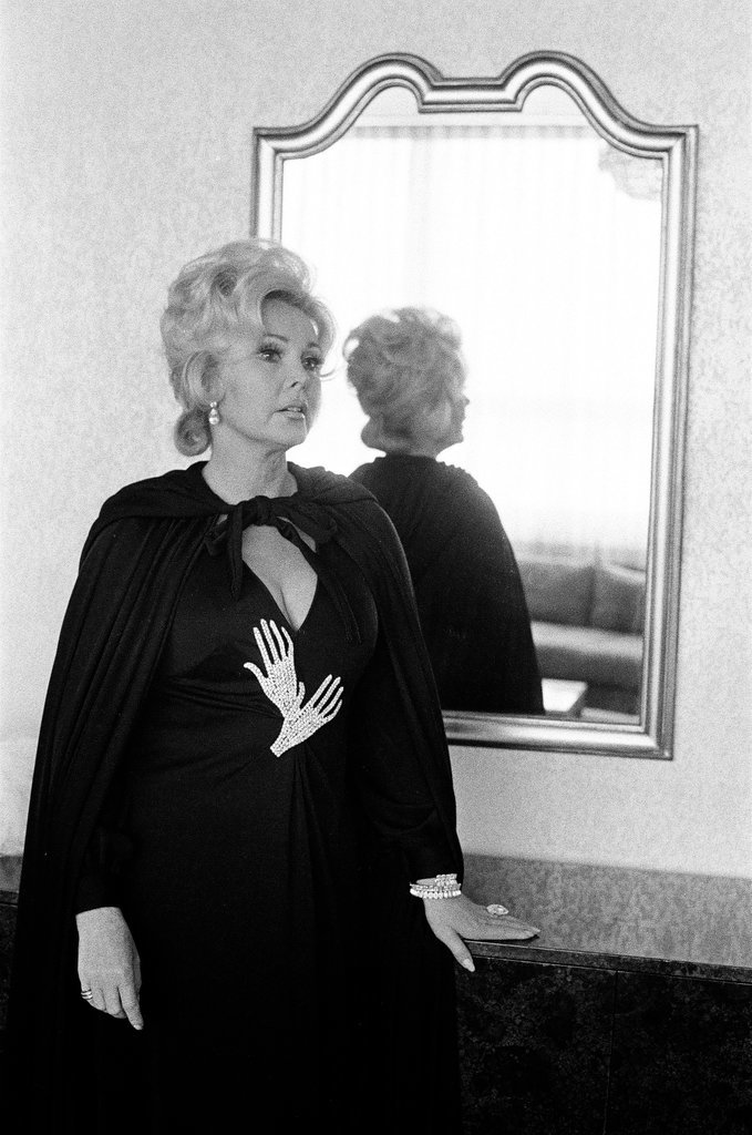 Zsa Zsa Gabor poses in hotel room - Fred Stein for Chicago Daily News