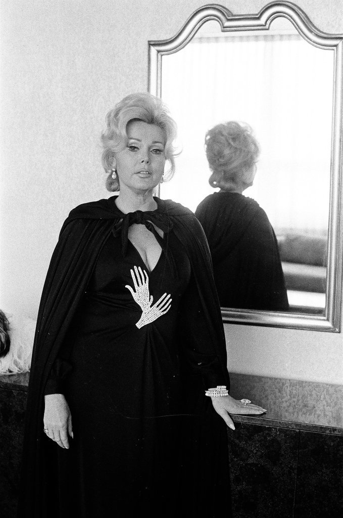 Zsa Zsa Gabor poses in hotel room - Fred Stein for Chicago Daily News