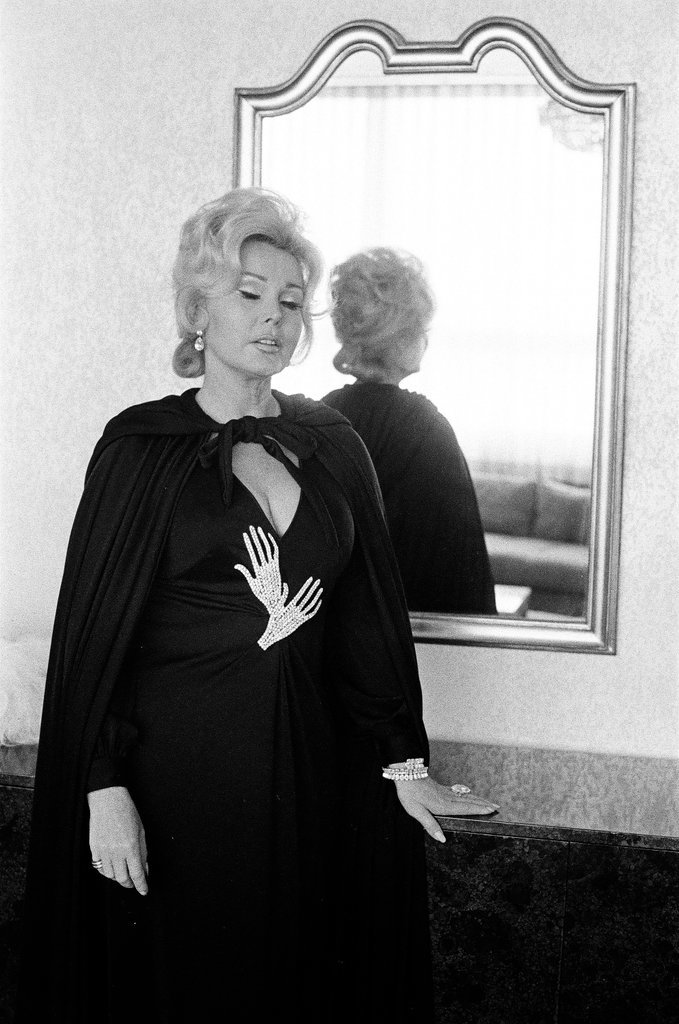 Zsa Zsa Gabor poses in hotel room - Fred Stein for Chicago Daily News
