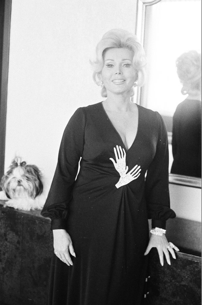 Zsa Zsa Gabor poses in hotel room - Fred Stein for Chicago Daily News