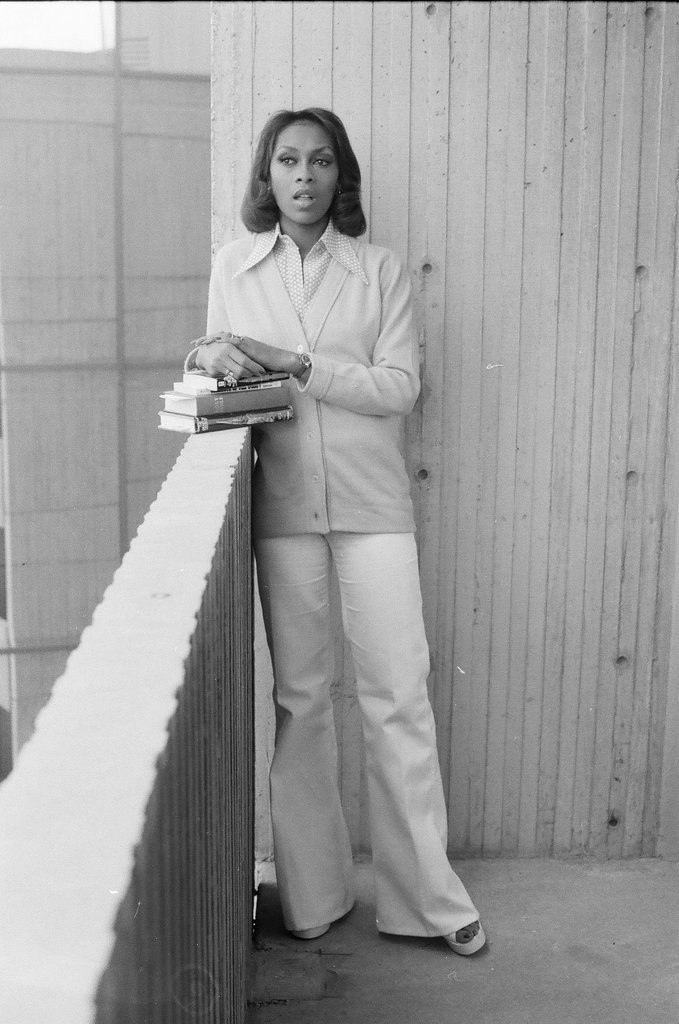 Lola Falana posing with stack of books - Fred Stein for Chicago Daily News