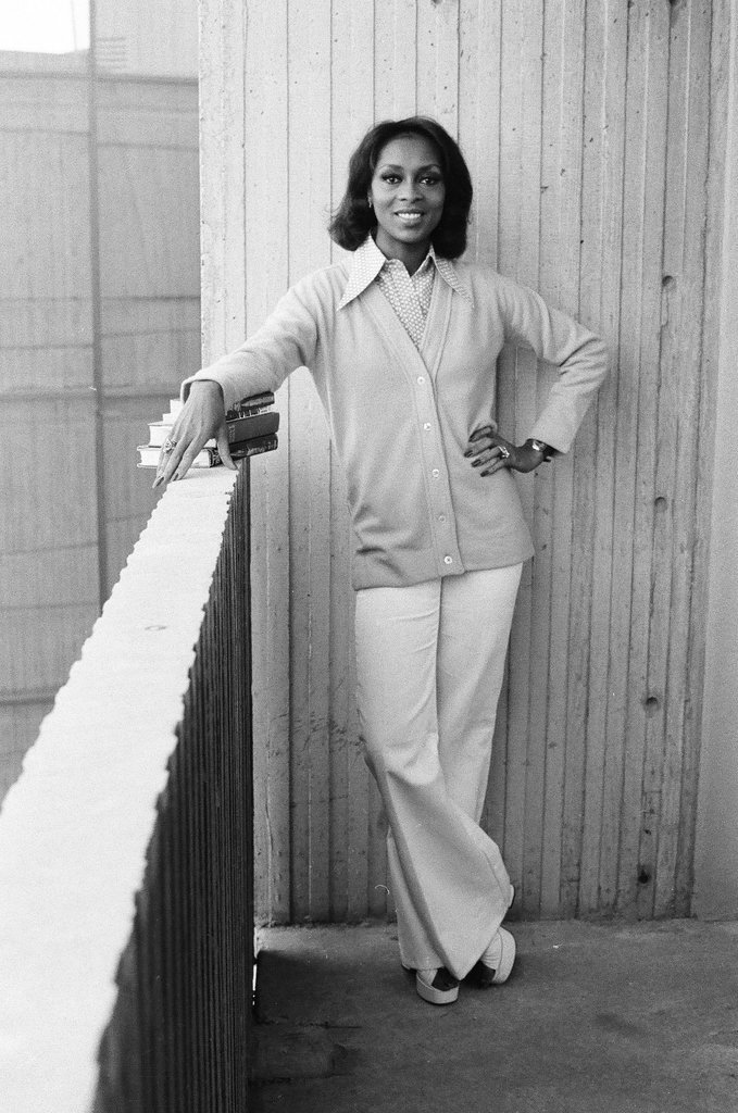 Lola Falana posing with stack of books - Fred Stein for Chicago Daily News
